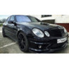 Предна тунинг броня за Mercedes W211 E-Class (2002-2009) - AMG с черна решетка и халогени